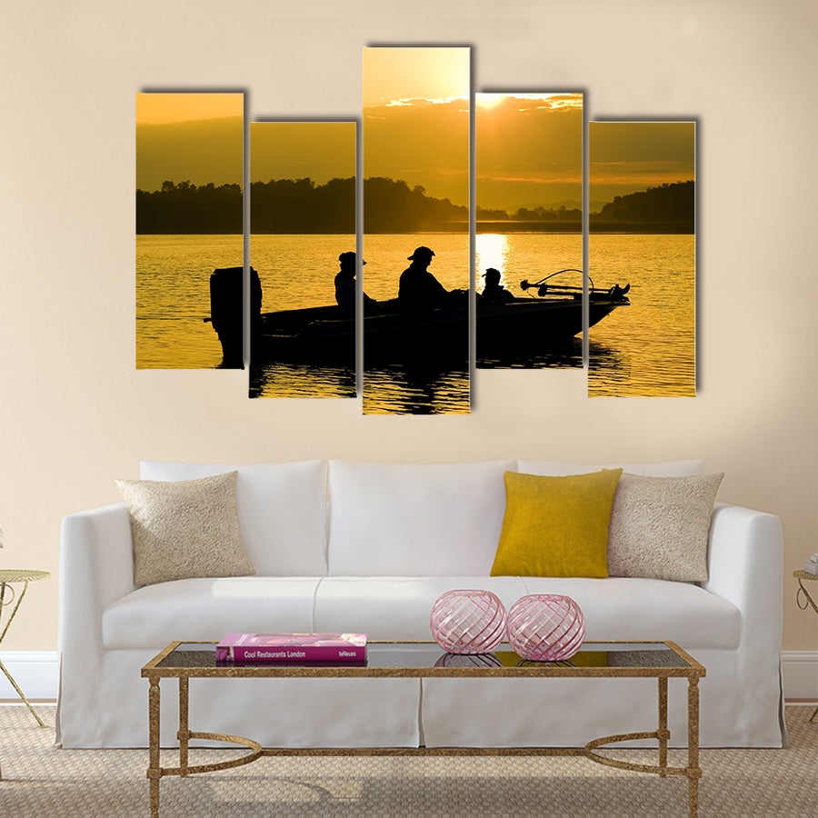 Fishermen boating on a lake at sunrise multi panel canvas wall art