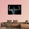 An image of a handsome young muscular sports man Multi panel canvas wall art