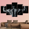 An image of a handsome young muscular sports man Multi panel canvas wall art