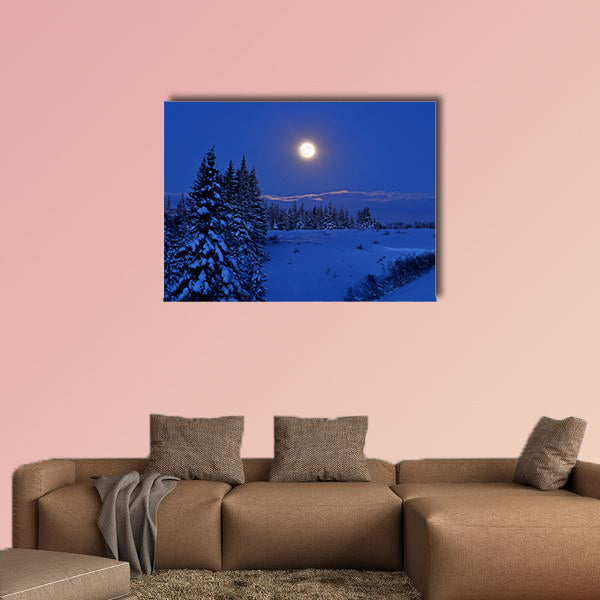 Full moon rising over a winter landscape in Alaska multi panel canvas wall art