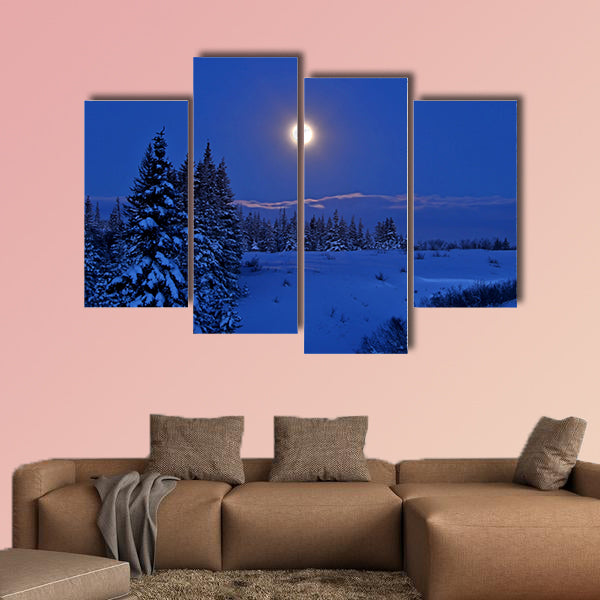Full moon rising over a winter landscape in Alaska multi panel canvas wall art