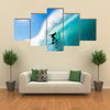 Surfer on Blue Ocean Wave Multi panel canvas wall art