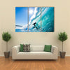 Beautiful view of Surfer on Blue Ocean Wave Multi panel canvas wall art