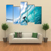 Beautiful view of Surfer on Blue Ocean Wave Multi panel canvas wall art