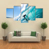 Beautiful view of Surfer on Blue Ocean Wave Multi panel canvas wall art