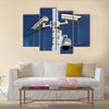 Three cctv security cameras on street pylon Multi panel canvas wall art