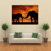 silhouette elephant in the sunset multi panel canvas wall art