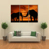 silhouette elephant in the sunset multi panel canvas wall art