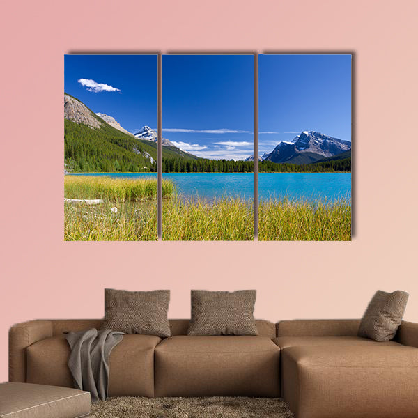 Canadian landscape with canoe in Pyramid lake Multi panel canvas wall art