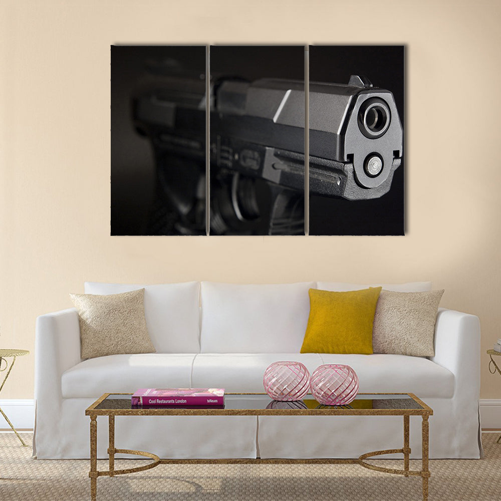 Close Up of pistol  multi panel canvas wall art