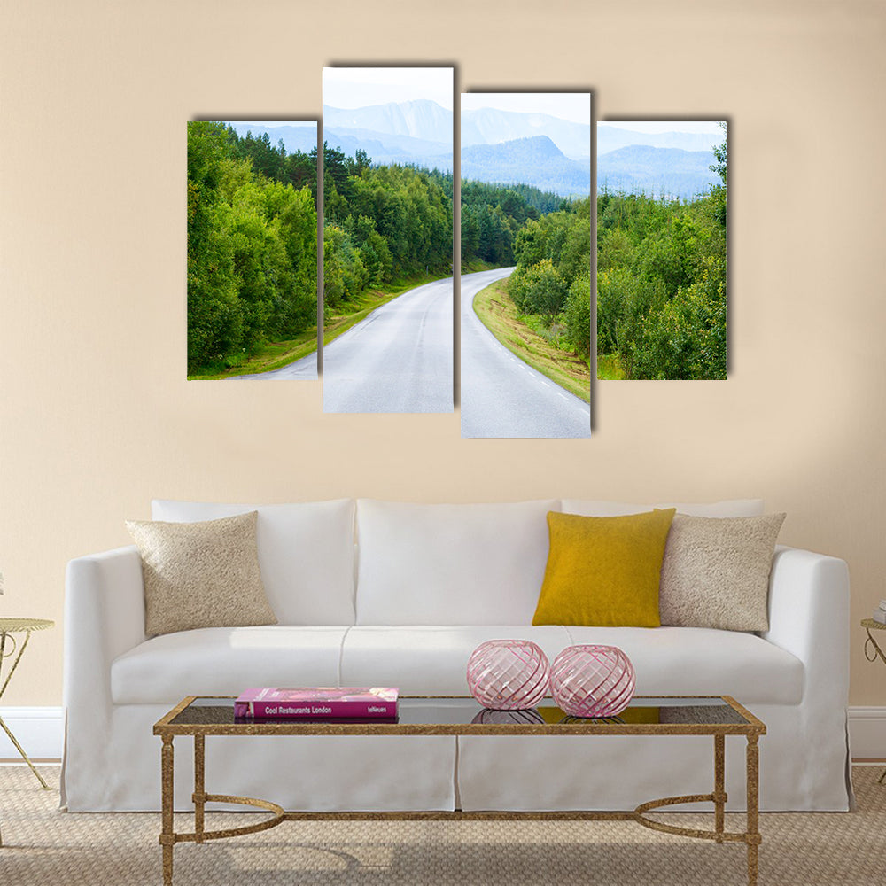 Scenic winding road through green forest in Norway multi panel canvas wall art