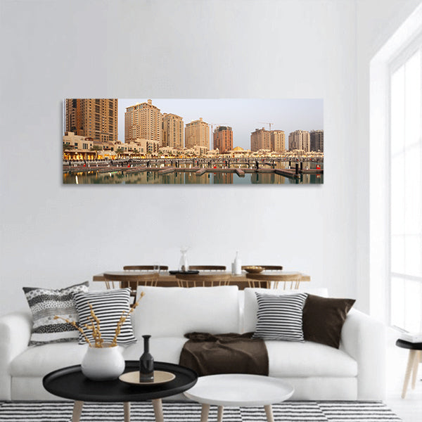 Residential buildings and empty Marina at The Pearl in Doha, panoramic canvas wall art