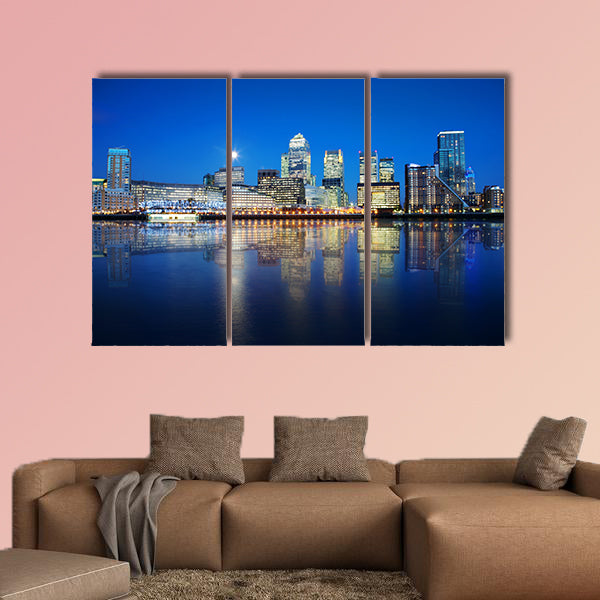 London skyscrapers reflected on water at night multi panel canvas wall art