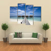 Luxury hotel in tropical island with white sand beach, multi panel canvas wall art