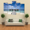 Luxury hotel in tropical island with white sand beach, multi panel canvas wall art