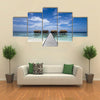 Luxury hotel in tropical island with white sand beach, multi panel canvas wall art