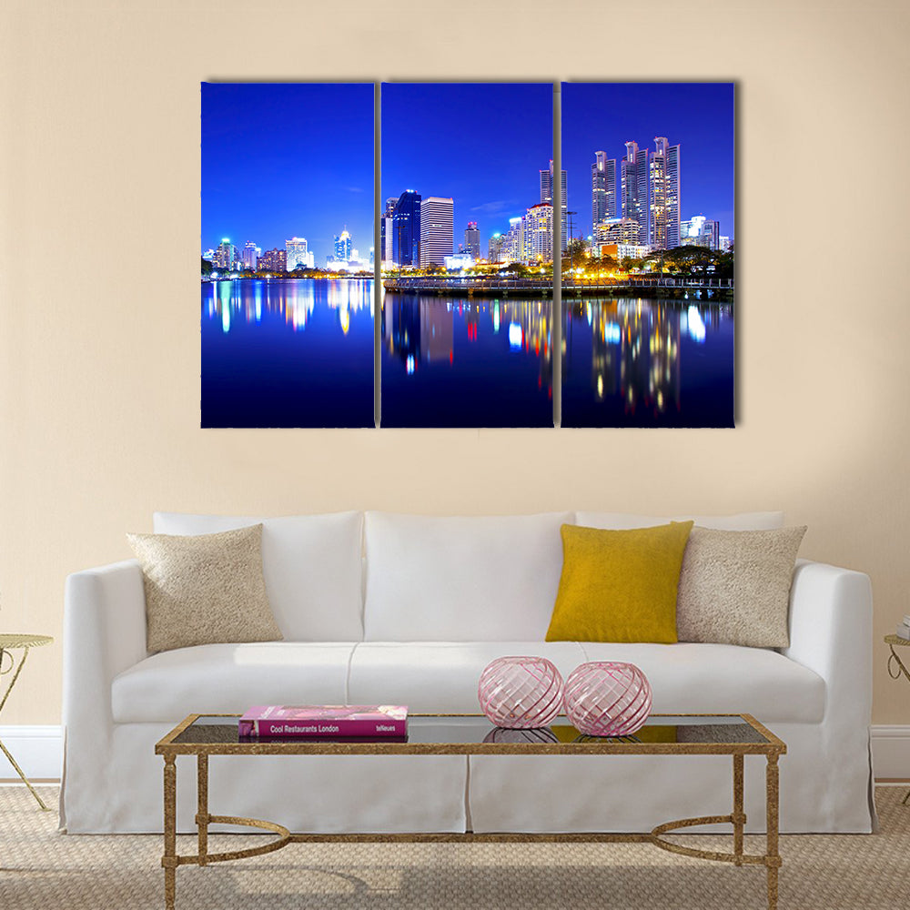 Bangkok city downtown at night with reflection of skyline multi panel canvas wall art