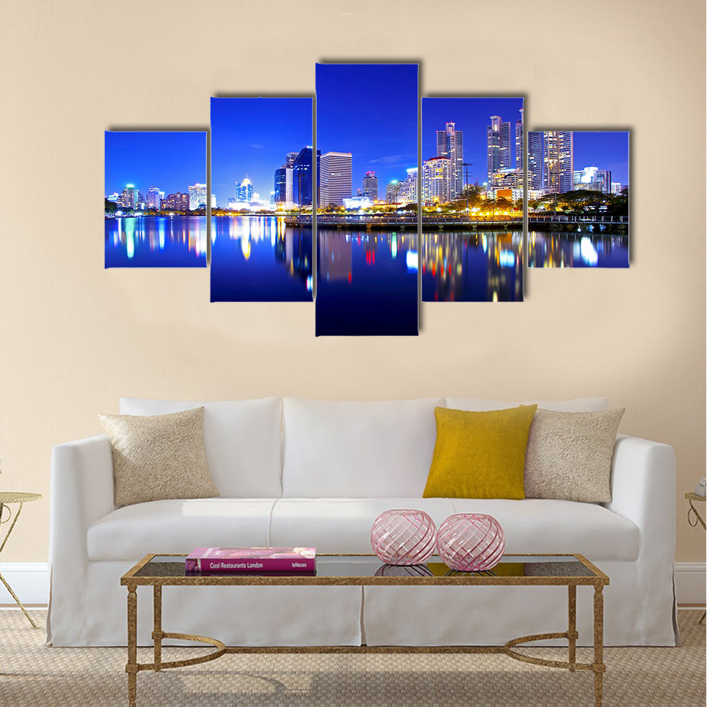 Bangkok city downtown at night with reflection of skyline multi panel canvas wall art