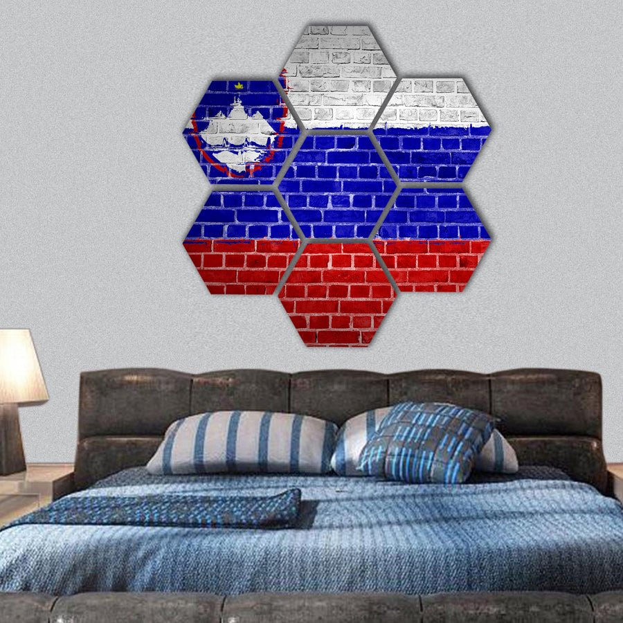 Slovenia flag painted on a brick wall hexagonal canvas wall art