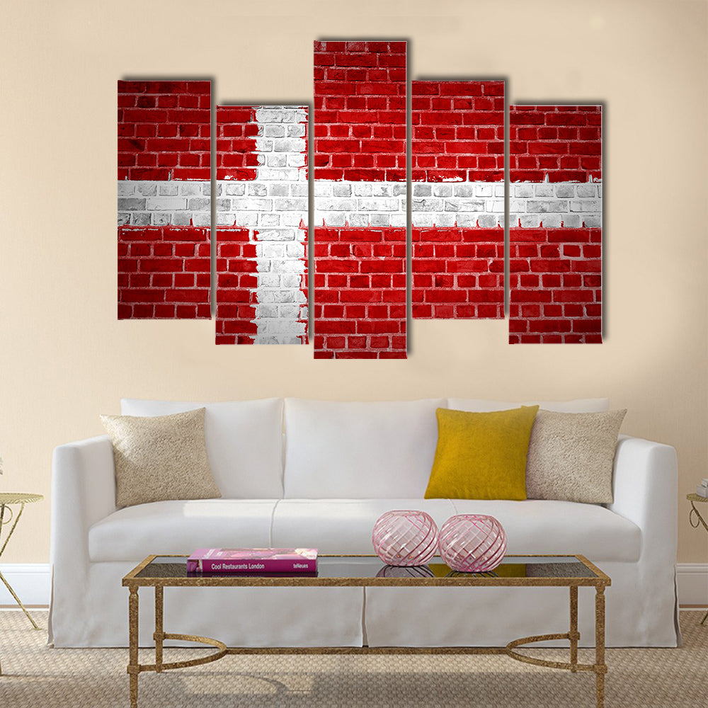 An image of the Denmark flag painted on a brick wall Multi Panel Canvas Wall Art