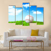 Base ball in green grass field with blue sky background Multi panel canvas wall art