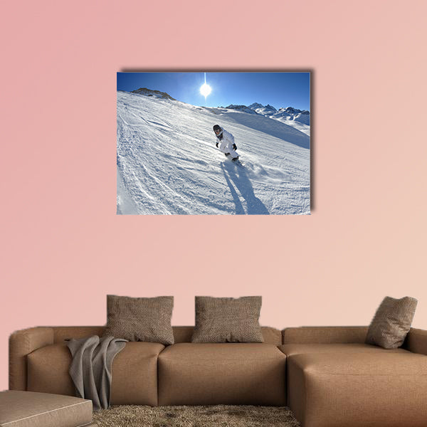 Skier skiing downhill on fresh powder snow with sun and mountains wall art