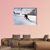 Skier skiing downhill on fresh powder snow with sun and mountains canvas wall art