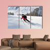 Skier skiing downhill on fresh powder snow with sun and mountains canvas wall art