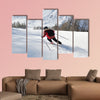 Skier skiing downhill on fresh powder snow with sun and mountains canvas wall art