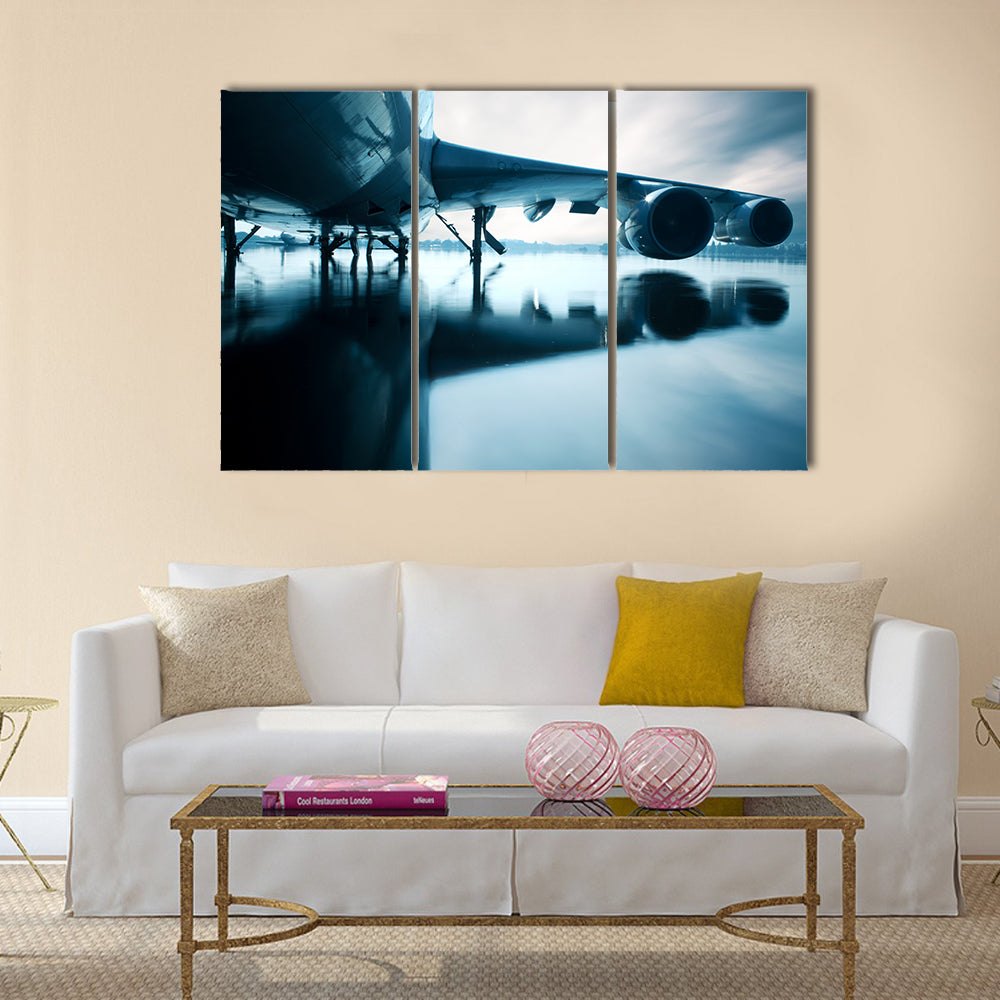 Airplane over water in the Thailand flooding at Donmaung International Airport multi panel canvas wall art
