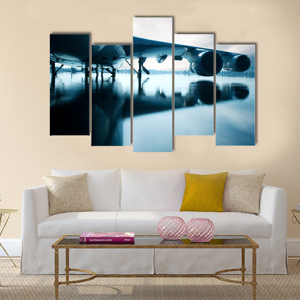 Airplane over water in the Thailand flooding at Donmaung International Airport multi panel canvas wall art