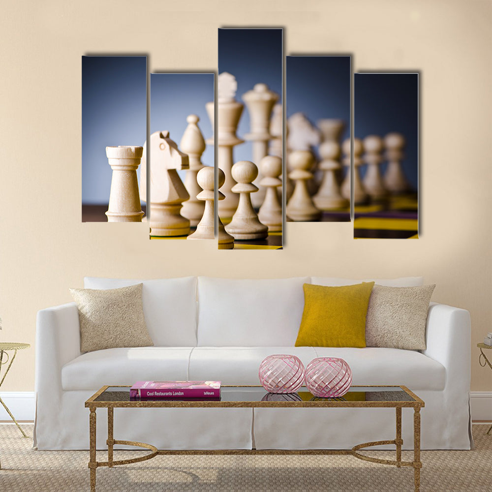 Concept of chess game with pieces multi panel canvas wall art