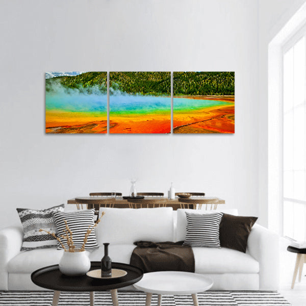 Beautiful cerulean geyser by colorful layers of bacteria, against cloudy blue sky panoramic canvas wall art