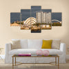 Sunlight on buildings as storm clouds gather beside River Clyde in Glasgow, UK, Multi Panel Canvas Wall Art