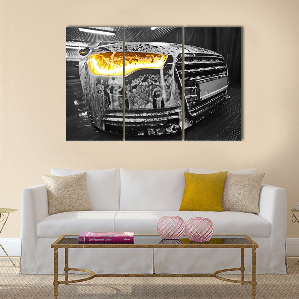 Prestigious new black car in foam on sink Multi panel canvas wall art