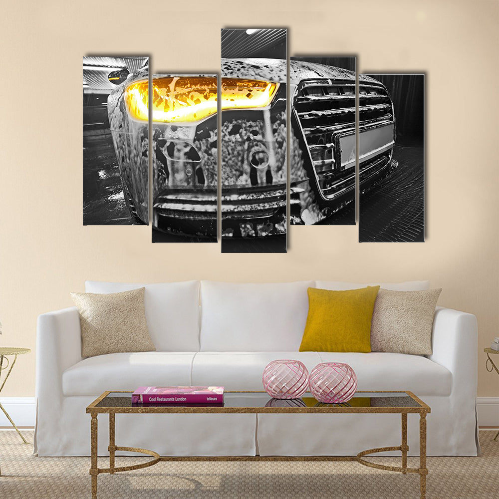 Prestigious new black car in foam on sink Multi panel canvas wall art
