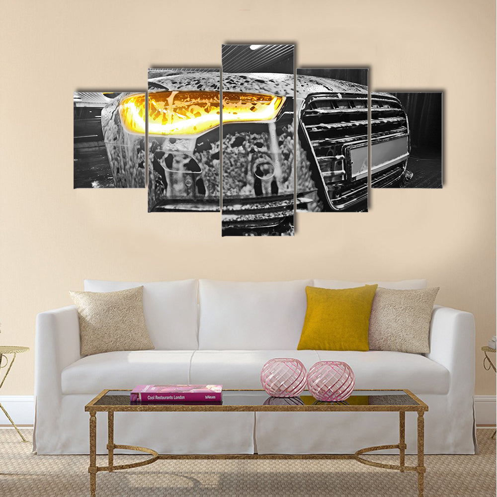 Prestigious new black car in foam on sink Multi panel canvas wall art