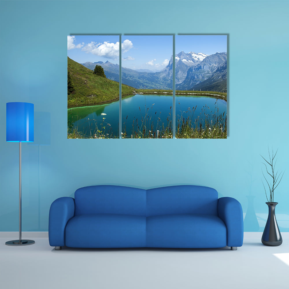 The artificial lake in the Swiss Alps multi panel canvas wall art