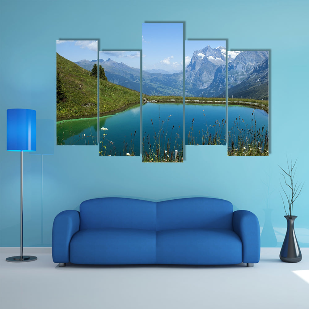The artificial lake in the Swiss Alps multi panel canvas wall art