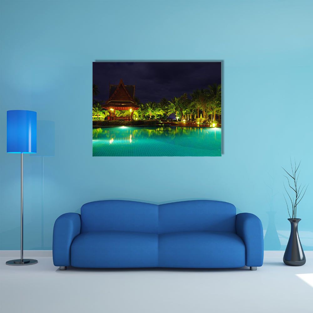 A Swimming pool in night illumination Multi Panel canvas wall art