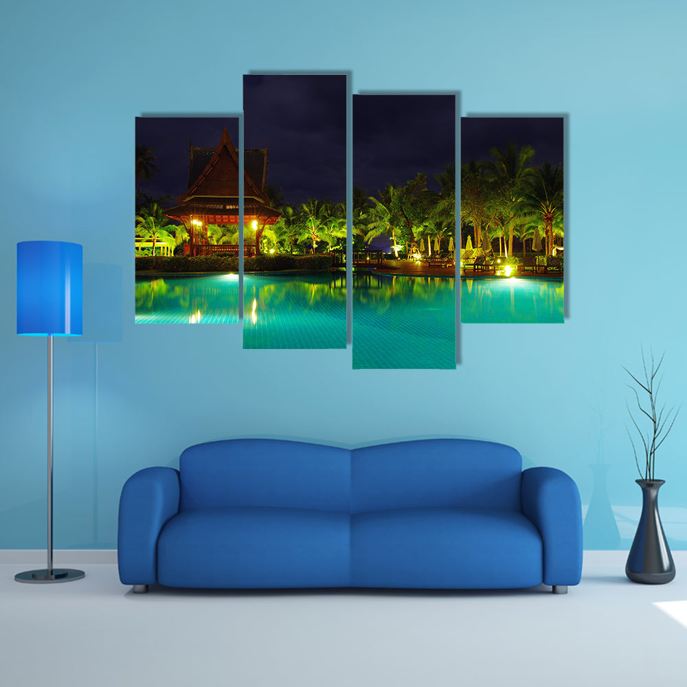 A Swimming pool in night illumination Multi Panel canvas wall art