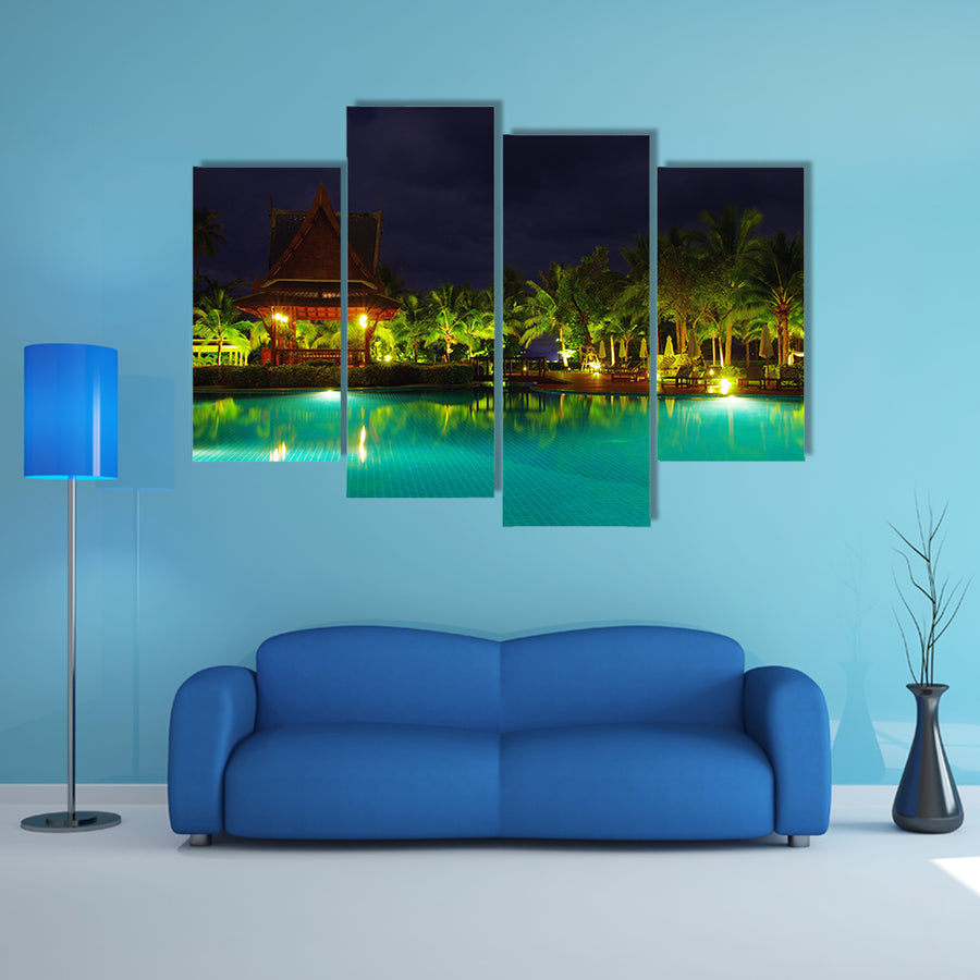 A Swimming pool in night illumination Multi Panel canvas wall art