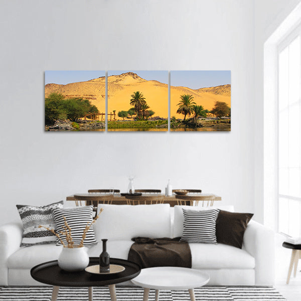 Reflection of a sand dune over the Nile river, Aswan, Egypt panoramic canvas wall art