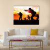 Silhouette illustration of a group of soldiers on the field Multi Panel Canvas Wall Art