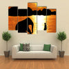 Elephant Training in Thailand During Sunset Silhouetted Multi Panel Canvas Wall Art