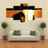 Elephant Training in Thailand During Sunset Silhouetted Multi Panel Canvas Wall Art