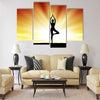 healthy woman practice yoga at beach during sunset silhouetted board Multi panel canvas wall art