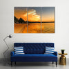 Spectacular-looking clouds at sunset Multi panel canvas wall art