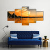 Spectacular-looking clouds at sunset Multi panel canvas wall art