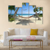 Exotic travel composition with a flying plane, a tropical beach Multi panel canvas wall art